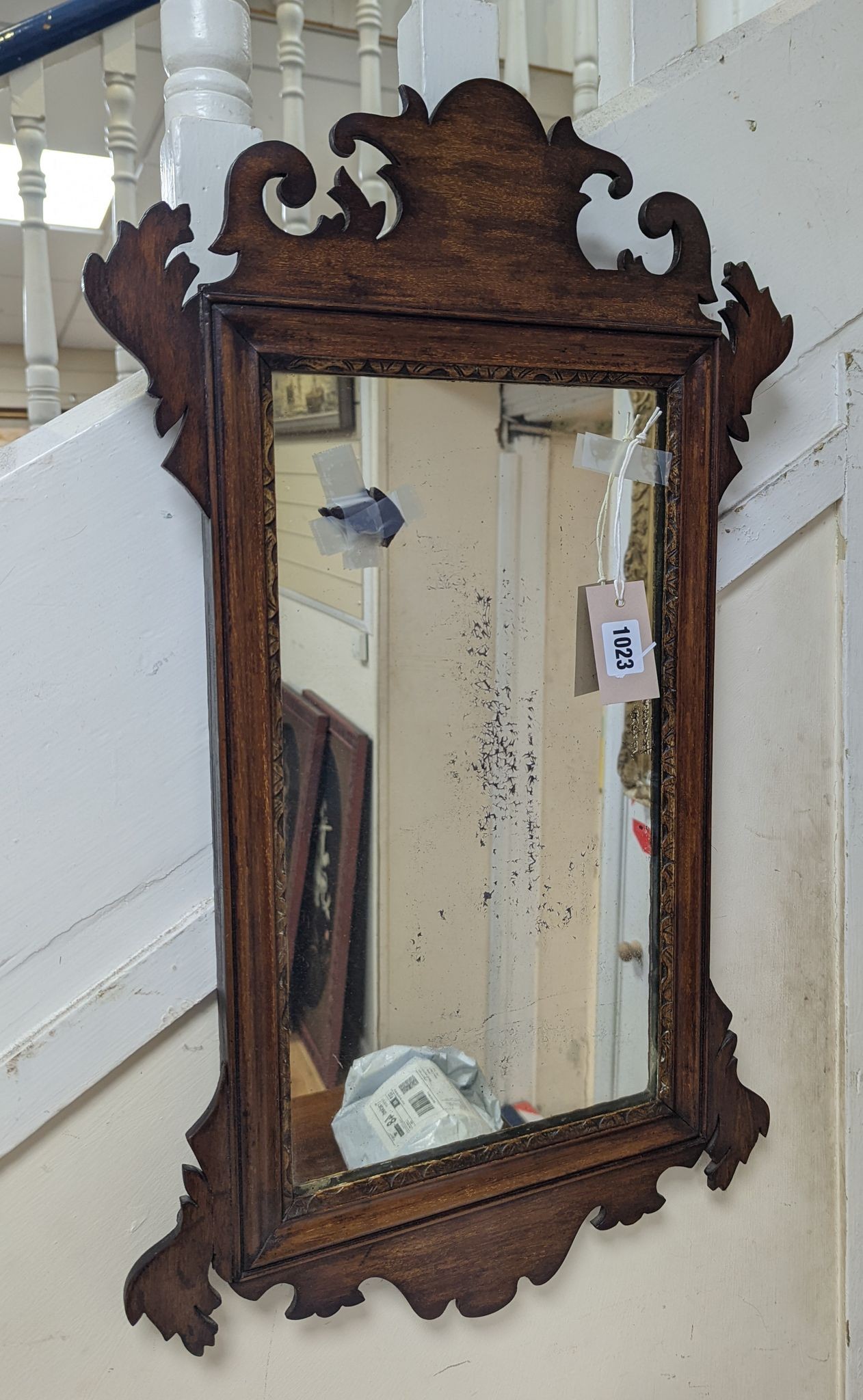 An Edwaridan George III style rectangular fret cut mahogany wall mirror, width 40cm, height 69cm